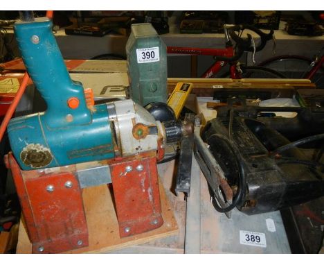 Three old electric tools. 