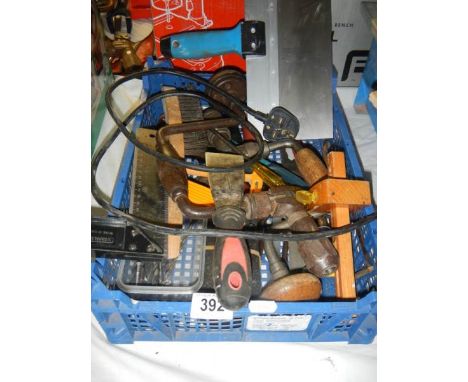 A tray of old tools. 