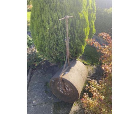 A large garden roller.