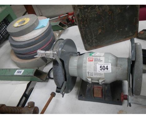 A bench grinder a/f and grinding wheels. 