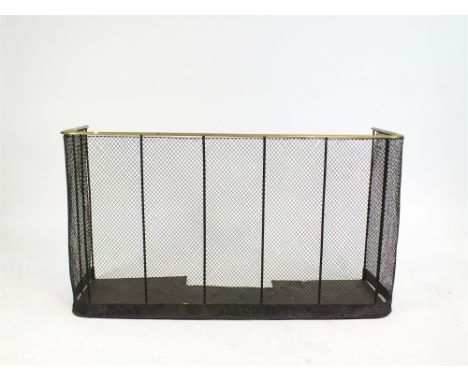 A 19th century brass framed latticed wire work fireguard, the polished brass rail supporting ten vertical bars, 123 x 69 cm.
