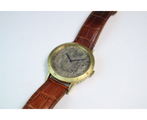 Stauer - 1783 8 Reales Ferdinand silver coin watch, yellow metal case on crocodile print leather strap. Blued Breguet hands. 