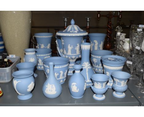A collection of Wedgwood Jasper ware, decorated in blue and white sprigged with classical motifs, to include a large Campaign