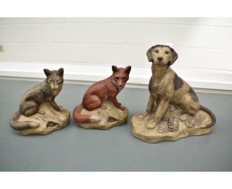 Three Barbara Linley Adams Poole Pottery stoneware animal studies comprising two foxes, brown and red, and a seated dog. All 