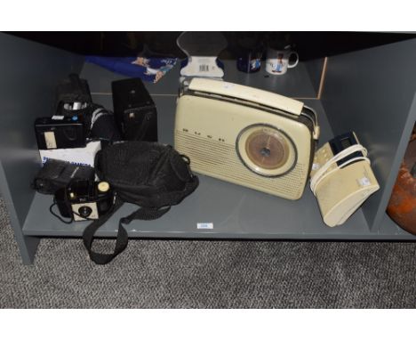 A Sony Dream Machine Clock Radio, having repeat alarm/sleep off function, w20cm, sold together with a Bush radio, a Kodak Bro