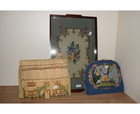 A vintage serving tray decorated having handmade floral needlepoint work encased within a mahogany surround, L55cm, sold toge