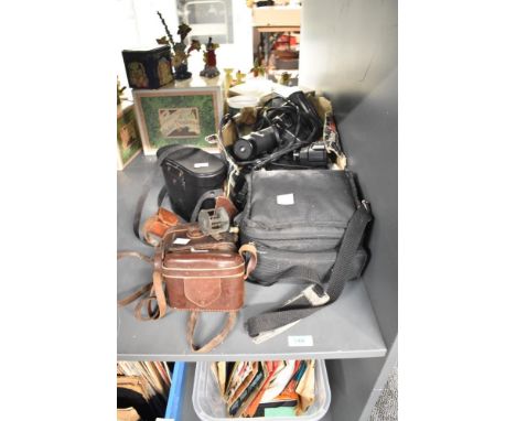 A selection of cameras and camera equipment, to include a Super Paxette, a Pentax, a Kodak Retina Iia ect