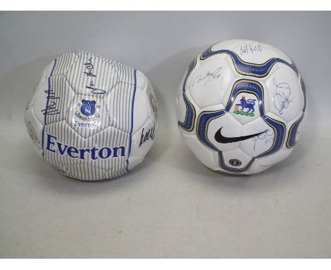 Two signed Footballs; one on a Everton Logo Football and another with Kevin Nolan's signature. We are unable to verify the au