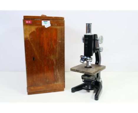 A vintage Watson Barnet microscope contained in wooden case. [W]