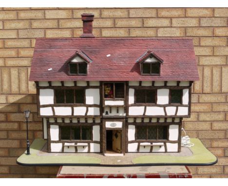 Clive Addis - "The Ultimate Dolls House " by Clive Addis. This custom finished wooden 1/12 scale Tudor doll's house named Bea