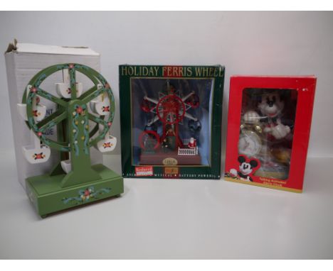 Lot to include a Disney Mickey Mouse Talking Animated Alarm Clock, a Maisto Holiday Ferris Wheel and one further ferris wheel