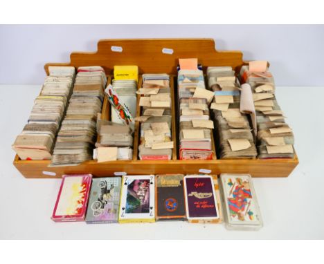 Playing Cards - Approximately 80 various mostly loose, with some boxed playing cards. In a card stand. Included is a Kennedy 