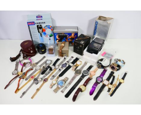 A collection of mixed watches, camera accessories and other electrical items. To include; a Casio Baby G wristwatch and Oris 
