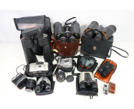 A collection of binoculars, lenses and cameras to include; Celestron Skymaster 15x70 binoculars and a Canon Powershot A620 ca