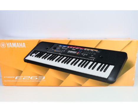 Yamaha - A Yamaha PSR-E263 Digital Keyboard, it appears to be in Very Good condition in a Good box that has shelf storage wea