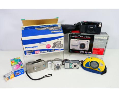 A collection of vintage cameras, digital cameras and film; a Fujifilm digital camera A860, a boxed Panasonic NV-GS35 digital 