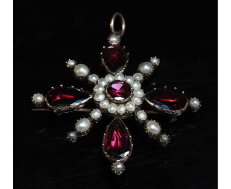 A Georgian gold-foiled garnet and split pearl cruciform brooch/pendant,a central cluster composed of a circular flat cut foil