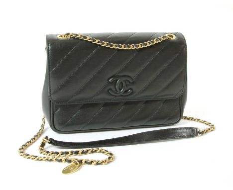 A Chanel black chevron flap bag, calf skin leather, double 'CC' black leather logo to front, gold tone chain and leather shou