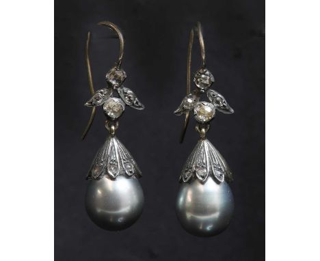 A pair of cultured pearl diamond drop earrings,with a late Victorian spray top with graduated rose cut diamonds, claw set in 