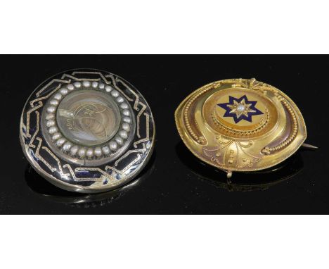 A Victorian Etruscan Revival gold marquise-shaped shield form brooch,with a raised oval boss to the centre, a split pearl, gr