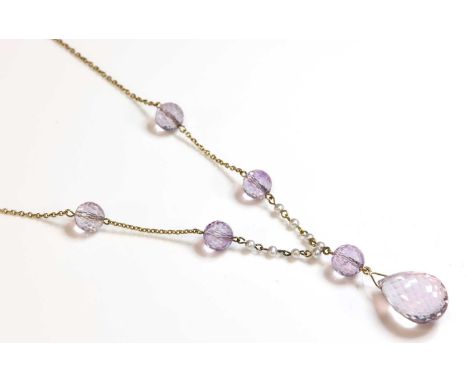 A gold amethyst and pearl necklace,with an amethyst briolette drop suspended below a faceted amethyst bead. A section at eith