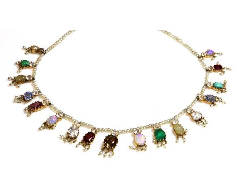 A Victorian seed pearl and gemstone graduated fringe necklace, c.1890,with assorted gemstones to include smoky quartz, topaz,