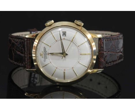 A gentlemen's steel and gold Jaeger-LeCoultre 'Memovox' automatic strap watch, c.1965,a circular 37mm case with a silvered di