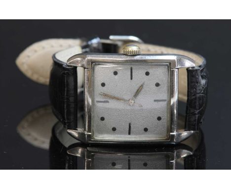 A gentlemen's stainless steel Bumper automatic strap watch, c.1950,28mm square case, the square dial with a bespoke spark ero