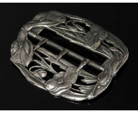 An Art Nouveau sterling silver belt buckle by William Comyns,with relief poppy flowers and buds with pierced detail. London 1