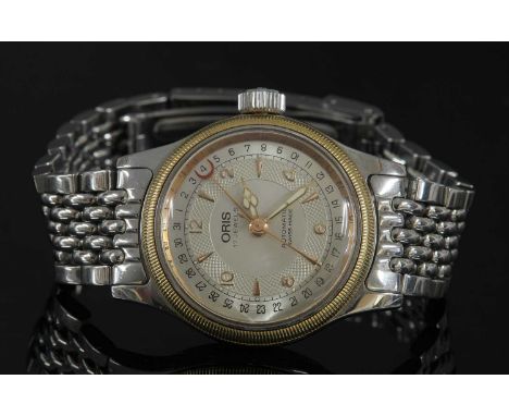 A mid-size stainless steel and gold Oris 'Big Crown' automatic bracelet watch, ref. 7400. A circular case, 31mm diameter, wit