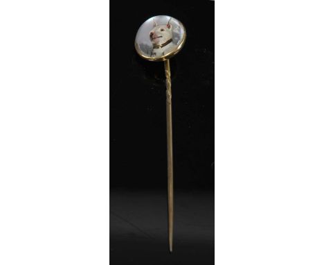 A cased Victorian reverse painted crystal intaglio stick pin, depicting a dog with collar. The circular crystal intaglio, 13.