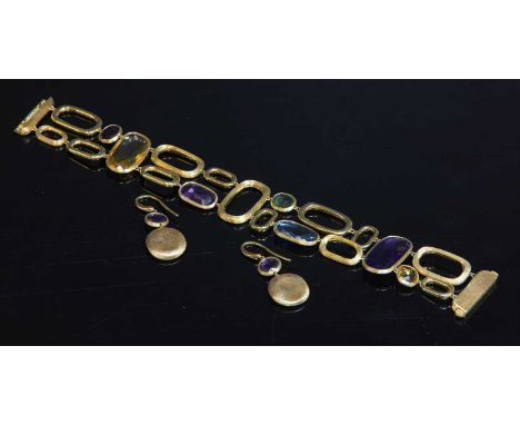 An 18ct gold Murano gemstone bracelet by Marco Bicego,with assorted gemstones to include amethyst, blue topaz, citrine, garne