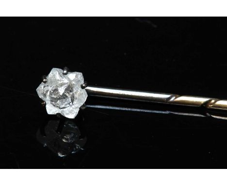 A cased single stone diamond stick pin, with a natural six-point star form diamond twinned crystal, 6.20 x 6.00mm in size, cl