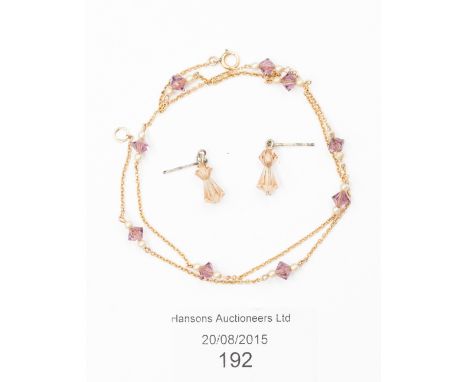 An amethyst type and simulated seed pearl necklace, stamped 9ct, together with a pair of drop earrings