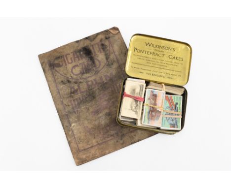 A cigarette card album with a tin of cigarette cards, including many Ogdens, Gallagher, Nicolas Sarony, R J Lea, etc, some co