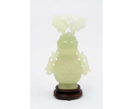 A modern pale jade covered koro on a wooden stand, height 14cm