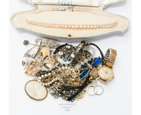 A collection of costume jewellery including yellow metal ring, watches, Art Deco paste, silver, etc 