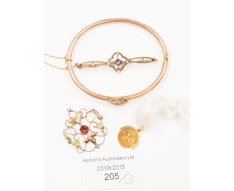 An Art Nouveau and garnet pendant on 9ct gold, an amethyst and seed pearl bar brooch and a 9ct gold bangle, etc  