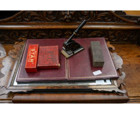 A letterhead embosser, dominoes, mother of pearl seal, two mirrors, etc.