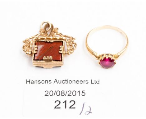 A 9ct gold fob and a ring set ruby