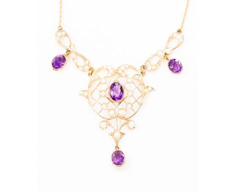 An amethyst and pearl openwork pendant on fine chain 