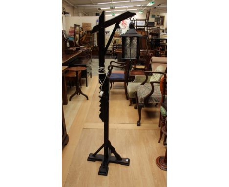A 1970's beech framed adjustable standard lamp, in the form of a lantern on stand, height 153cm