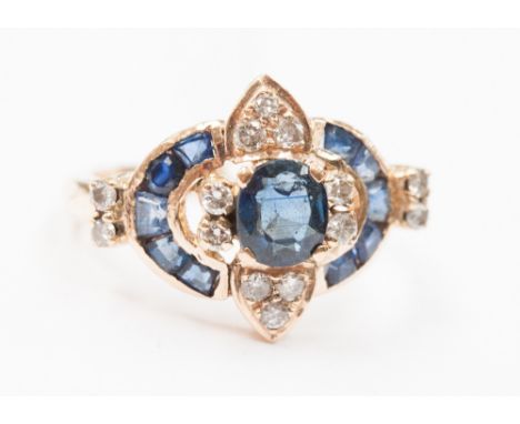 A sapphire and diamond dress ring.