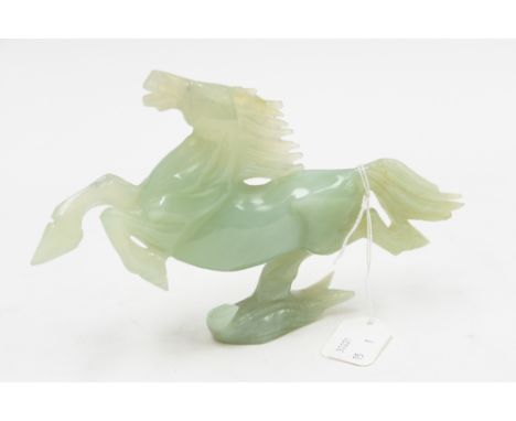 A modern pale jade figure of a prancing horse, width 19cm