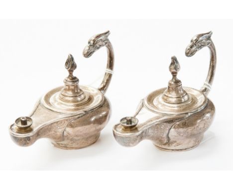 A pair of silver (London 1937) cigarette lighters in form of Arabian lamp, with military connections, presented by Wing Comma