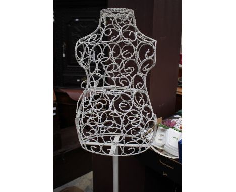 A wrought iron -mannequin' that can be used for candles/plants, etc. (white)