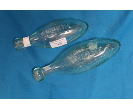 Two 19th Century green glass torpedo bottles, both for R M Mills and Co Bourne, Lincolnshire, aerated water 