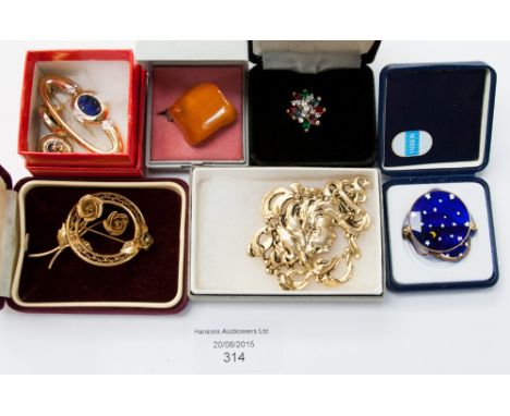 A yellow metal cluster ring with coloured paste, a Murrina moon and stars brooch and matching earrings, a Ciro brooch and ear