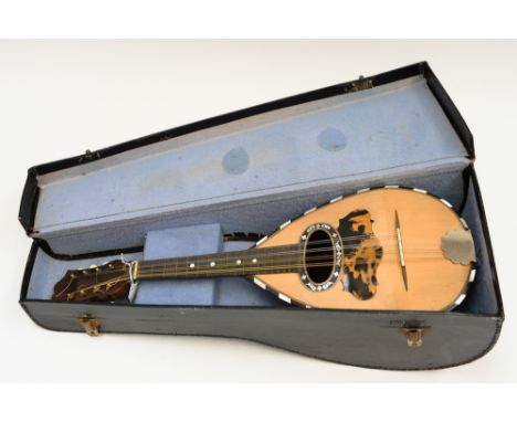 A cased mandolin eight strings, bone turning keys, body inlaid with ebony and mother of pearl 