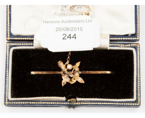 A 15ct bar brooch with ivy leaf and seed pearl detail a/f circa 1925 in Elkington & Co.